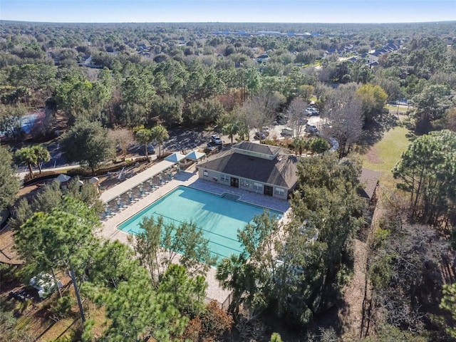 4119 Autumn Amber Dr, Spring Hill, FL 34609 - aerial view of property and surrounding area with a pool and a heavily wooded area