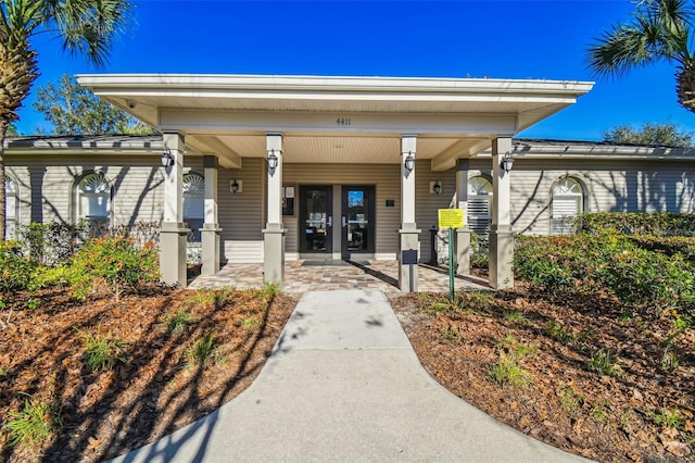4119 Autumn Amber Dr, Spring Hill, FL 34609 - property entrance featuring covered porch