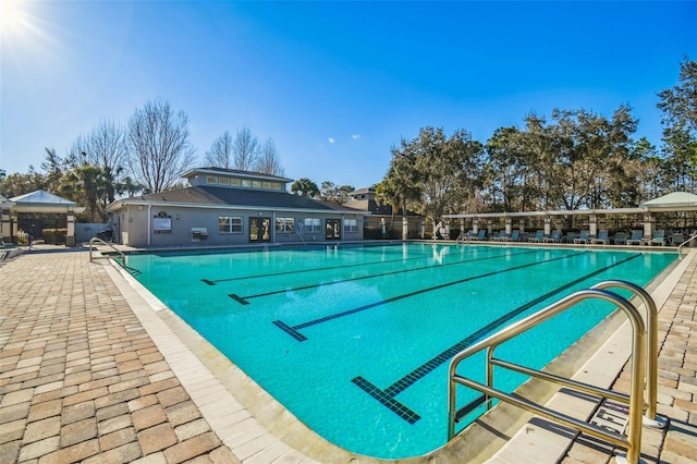 4119 Autumn Amber Dr, Spring Hill, FL 34609 - community pool with a patio area