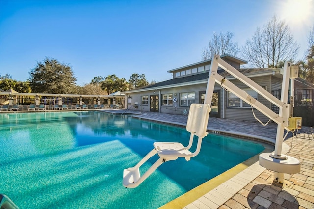 4119 Autumn Amber Dr, Spring Hill, FL 34609 - community pool with a patio