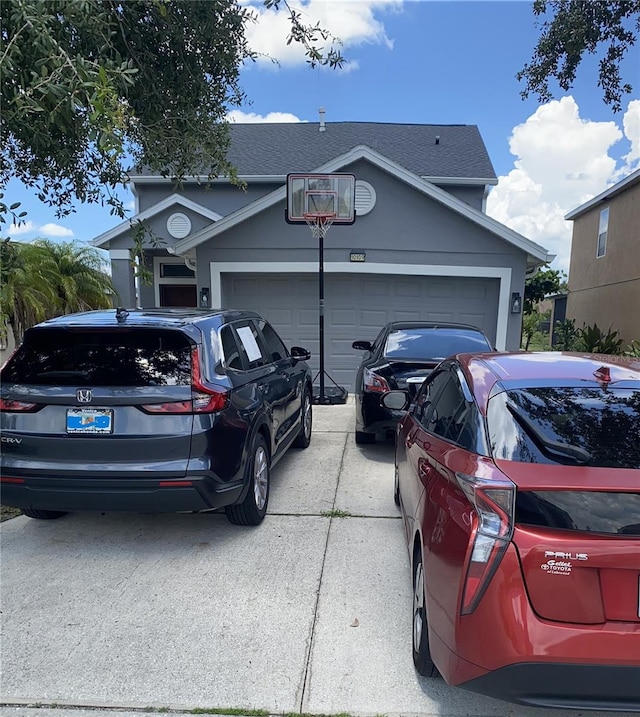 10109 36th Ct E, Parrish, FL 34219 - view of side of home featuring a garage and driveway