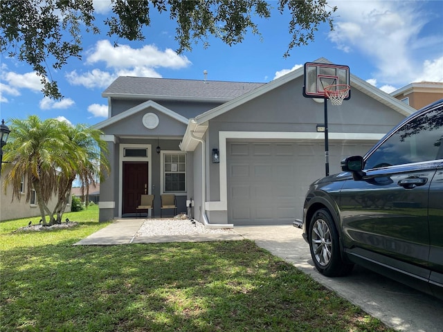 10109 36th Ct E, Parrish, FL 34219 - view of front of house with a garage, a front lawn, concrete driveway, and stucco siding