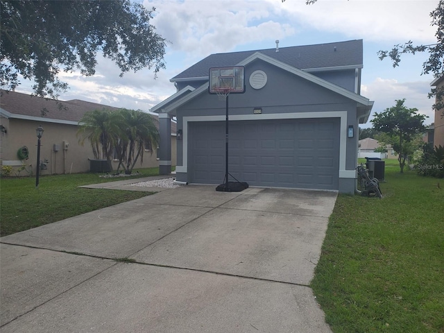 10109 36th Ct E, Parrish, FL 34219 - view of front of property with a front yard, driveway, stucco siding, and an attached garage