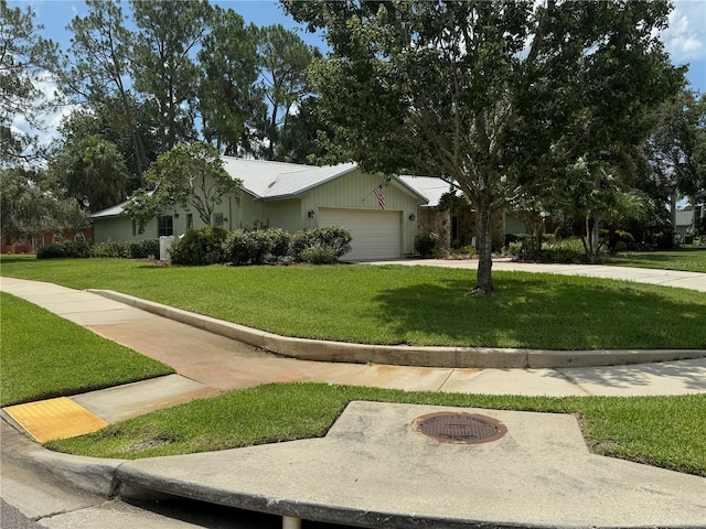 2215 Toniwood Ln, Palm Harbor, FL 34685 - ranch-style home featuring a front lawn and a garage