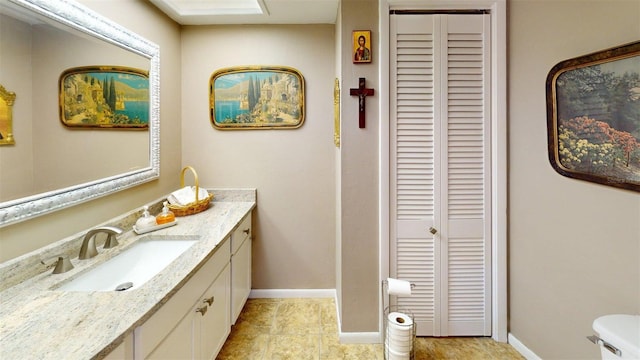 2215 Toniwood Ln, Palm Harbor, FL 34685 - bathroom with a closet and vanity