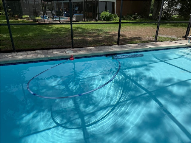 2215 Toniwood Ln, Palm Harbor, FL 34685 - swimming pool featuring a lanai and a yard