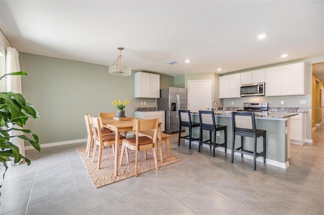 13304 Mylion Way, Spring Hill, FL 34610 - dining area featuring recessed lighting and light tile patterned floors