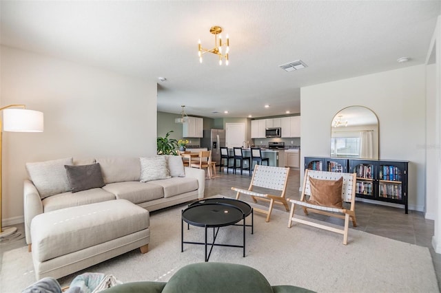 13304 Mylion Way, Spring Hill, FL 34610 - living area featuring a chandelier and recessed lighting
