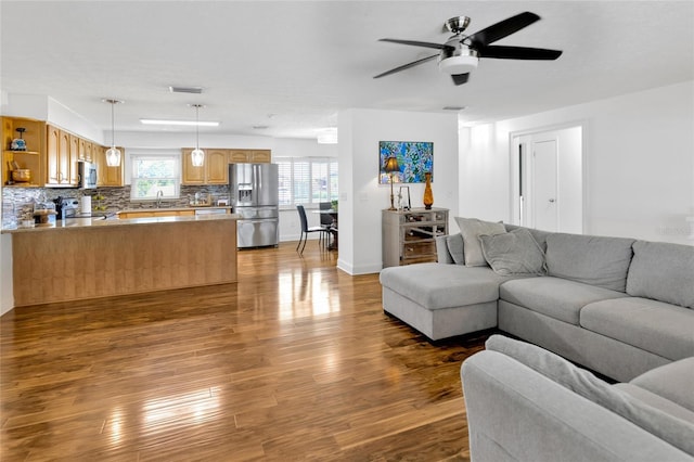 10811 Providence Oaks Dr, Riverview, FL 33578 - living room with dark wood-type flooring and a ceiling fan