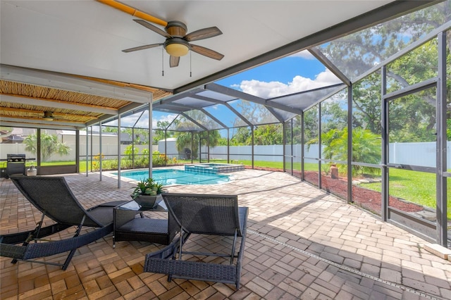 10811 Providence Oaks Dr, Riverview, FL 33578 - view of swimming pool featuring a ceiling fan, a fenced backyard, a patio, a pool with connected hot tub, and glass enclosure