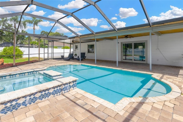 10811 Providence Oaks Dr, Riverview, FL 33578 - view of swimming pool featuring a patio area, a ceiling fan, a lanai, and a pool with connected hot tub