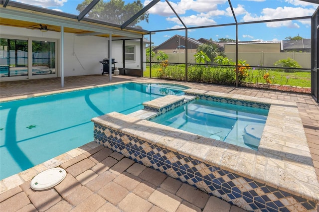 10811 Providence Oaks Dr, Riverview, FL 33578 - view of swimming pool with a patio area, a pool with connected hot tub, a ceiling fan, area for grilling, and a lanai