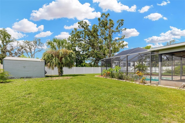 10811 Providence Oaks Dr, Riverview, FL 33578 - fenced backyard featuring a shed and a lanai