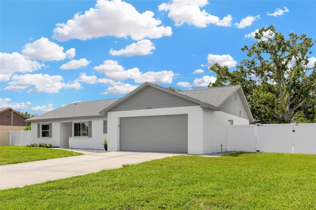 10811 Providence Oaks Dr, Riverview, FL 33578 - single story home with an attached garage, concrete driveway, roof with shingles, and brick siding