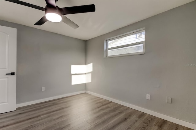 7031 Magnolia Valley Dr, New Port Richey, FL 34653 - empty room featuring wood finished floors and a ceiling fan