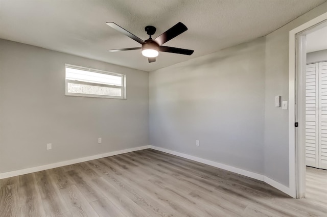 7031 Magnolia Valley Dr, New Port Richey, FL 34653 - spare room featuring ceiling fan and light wood-style flooring