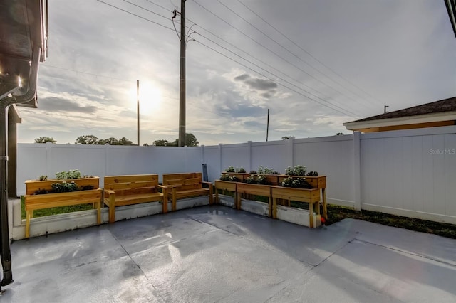 7031 Magnolia Valley Dr, New Port Richey, FL 34653 - fenced backyard with a patio area