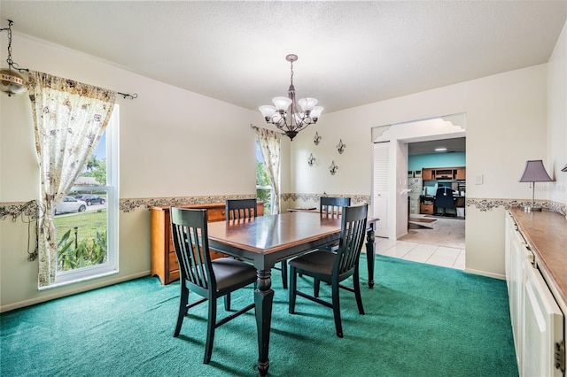 1810 Orange Hill Dr, Brandon, FL 33510 - dining space with light colored carpet and a chandelier