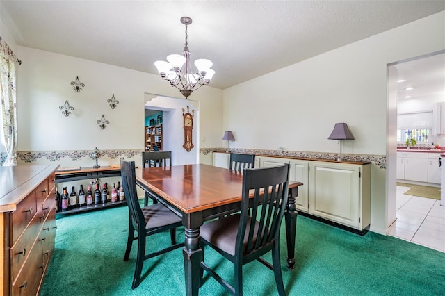 1810 Orange Hill Dr, Brandon, FL 33510 - dining room featuring a chandelier, light colored carpet, and light tile patterned floors
