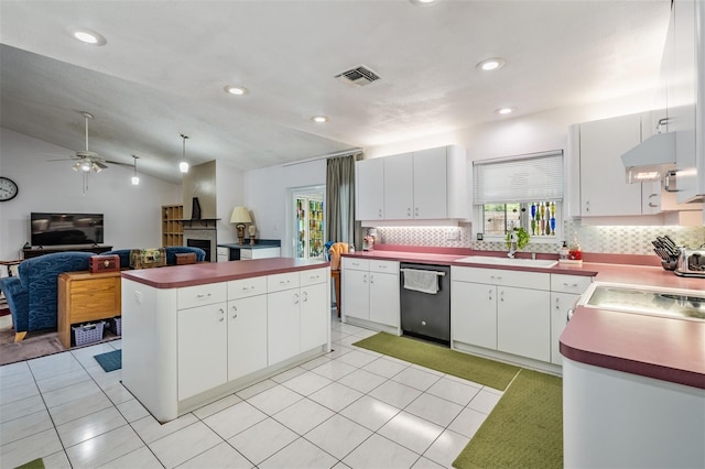 1810 Orange Hill Dr, Brandon, FL 33510 - kitchen featuring dishwasher, healthy amount of natural light, a ceiling fan, a center island, and lofted ceiling