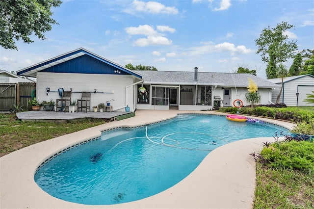 1810 Orange Hill Dr, Brandon, FL 33510 - view of pool with a sunroom and a wooden deck