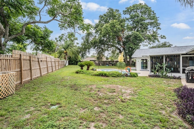 1810 Orange Hill Dr, Brandon, FL 33510 - fenced backyard featuring a sunroom