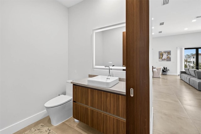 131 Forest Hills Dr, Redington Shores, FL 33708 - half bath with vanity and recessed lighting