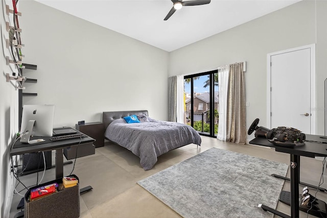 131 Forest Hills Dr, Redington Shores, FL 33708 - bedroom featuring a ceiling fan, finished concrete flooring, access to outside, and a desk