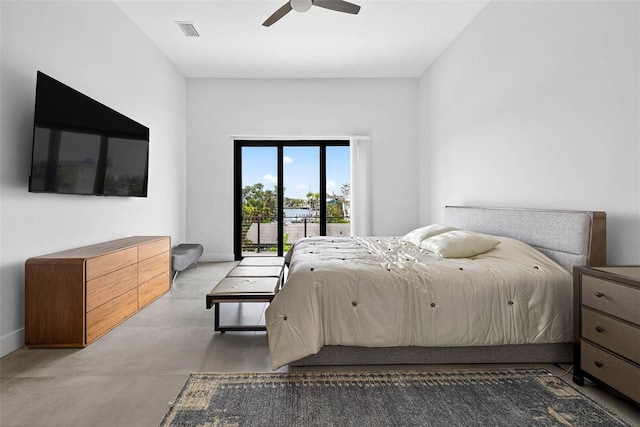131 Forest Hills Dr, Redington Shores, FL 33708 - bedroom featuring access to outside, finished concrete flooring, and ceiling fan