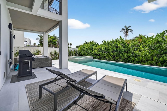 131 Forest Hills Dr, Redington Shores, FL 33708 - view of swimming pool featuring a grill, a patio area, and a pool with connected hot tub
