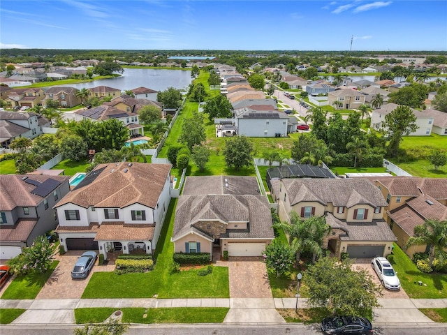 1138 Fountain Coin Loop, Orlando, FL 32828 - aerial perspective of suburban area featuring a large body of water