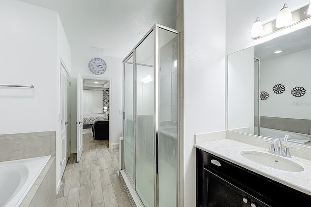 1138 Fountain Coin Loop, Orlando, FL 32828 - ensuite bathroom with a bath, a stall shower, and vanity
