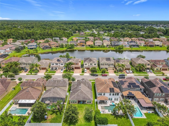 1138 Fountain Coin Loop, Orlando, FL 32828 - aerial view of residential area with a large body of water and a pool area