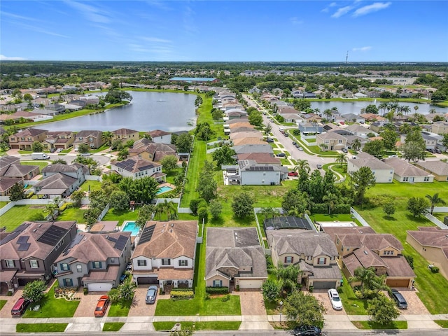 1138 Fountain Coin Loop, Orlando, FL 32828 - aerial view of residential area featuring a large body of water