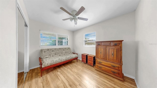 11460 Park Blvd, Seminole, FL 33772 - living area with light wood finished floors and a ceiling fan
