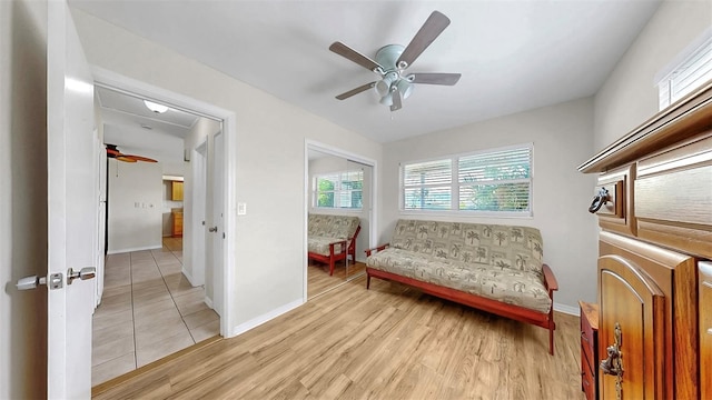 11460 Park Blvd, Seminole, FL 33772 - sitting room with a ceiling fan and light wood finished floors