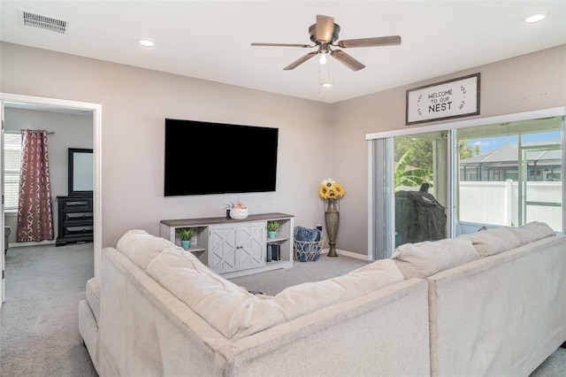 1518 Louise Ave, Auburndale, FL 33823 - living room featuring carpet floors, a ceiling fan, and recessed lighting