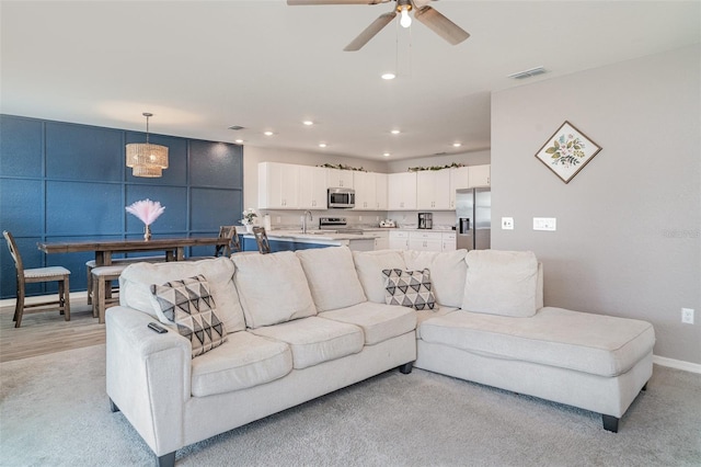 1518 Louise Ave, Auburndale, FL 33823 - living room featuring ceiling fan and recessed lighting