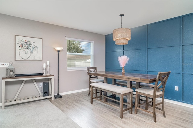 1518 Louise Ave, Auburndale, FL 33823 - dining area featuring light wood-type flooring and a chandelier