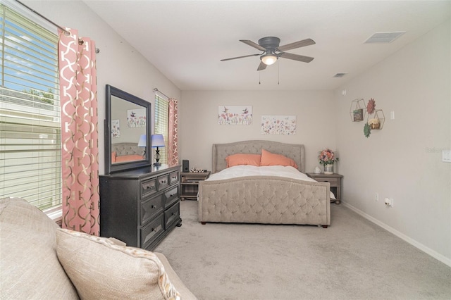 1518 Louise Ave, Auburndale, FL 33823 - bedroom featuring light carpet and a ceiling fan