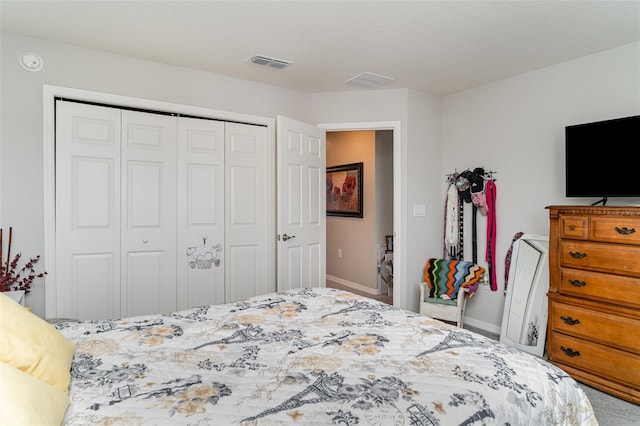 1518 Louise Ave, Auburndale, FL 33823 - carpeted bedroom featuring a closet and baseboards