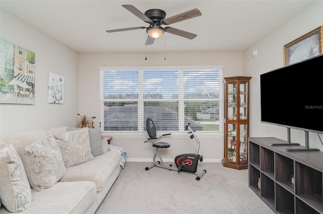 1518 Louise Ave, Auburndale, FL 33823 - carpeted living room featuring a ceiling fan and baseboards