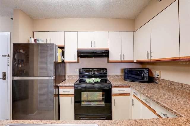 2333 Feather Sound Dr Unit A409, Clearwater, FL 33762 - kitchen featuring black appliances, ventilation hood, white cabinetry, light countertops, and a textured ceiling