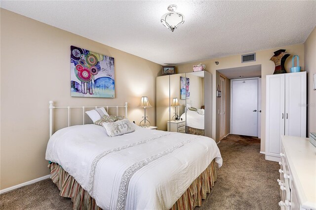 2333 Feather Sound Dr Unit A409, Clearwater, FL 33762 - bedroom with carpet floors and a textured ceiling