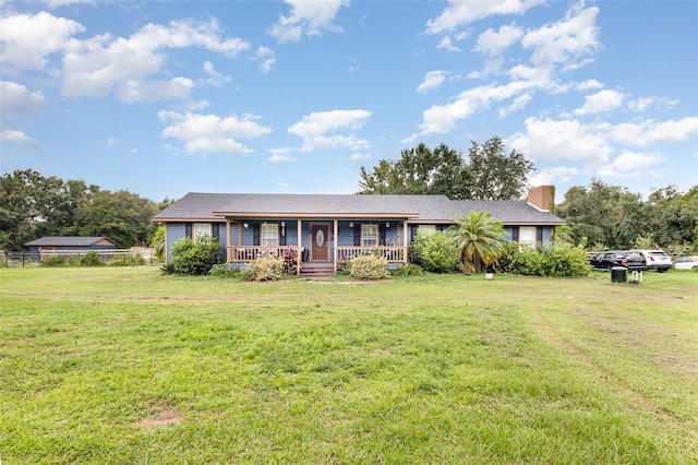 2410 Thornton Rd, Zolfo Springs, FL 33890 - single story home with a porch, a chimney, and a front yard
