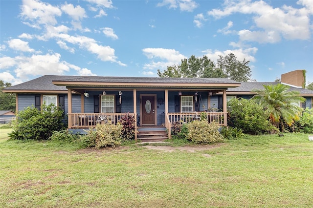 2410 Thornton Rd, Zolfo Springs, FL 33890 - ranch-style home with a front lawn and covered porch