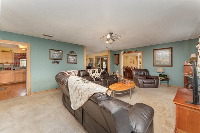 2410 Thornton Rd, Zolfo Springs, FL 33890 - living area featuring light colored carpet and baseboards