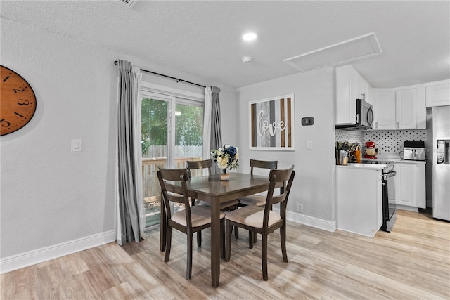 4460 67th St N, Saint Petersburg, FL 33709 - dining room with light wood-style floors