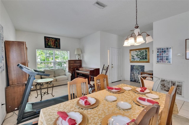 7603 Wood Violet Dr, Gibsonton, FL 33534 - dining space featuring a chandelier and light tile patterned flooring