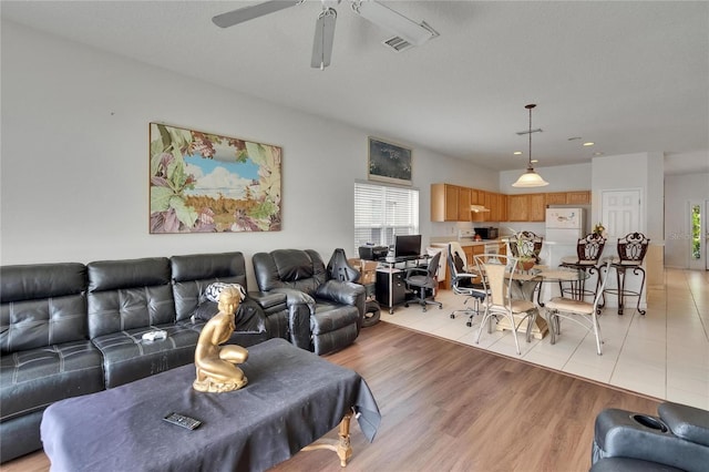 7603 Wood Violet Dr, Gibsonton, FL 33534 - living room featuring a ceiling fan, recessed lighting, and light wood-type flooring